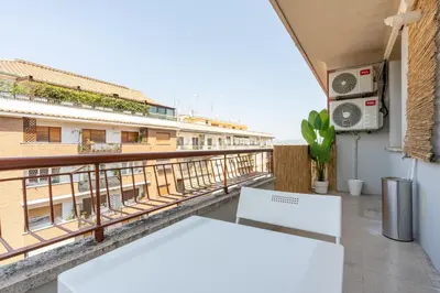 a balcony with a view of a building at Guest House Rome - Pigneto in Rome