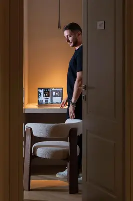 a man standing in front of a desk with a chair at Efes Hôtellerie in Rome