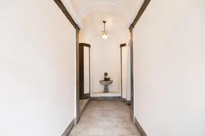 a hallway with a sink in the middle of a building at Pantheon Winning Position in Rome