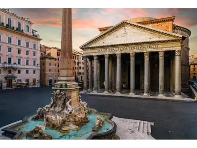 a building with a fountain in the middle of a city at Pantheon Winning Position in Rome