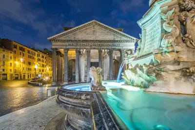 a large fountain in front of a building with a fountain at Pantheon Winning Position in Rome