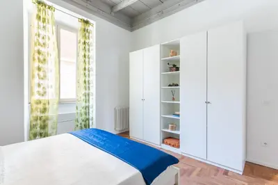 a bedroom with a bed and a window at Elegance near Navona-for 5 guests in Rome