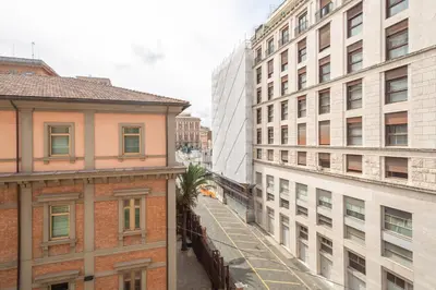 an alley between two buildings in a city at Suite Elizabeth in Barberini in Rome