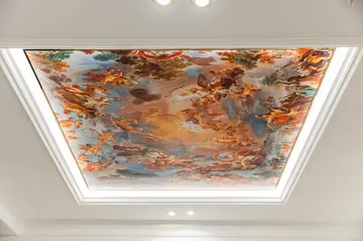 a painting of a ceiling in a room at La Bella Trevi in Rome
