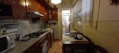 a small kitchen with a stove and a sink at casawally MetroB Marconi SanPaoloBasilica Colosseo in Rome