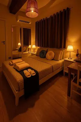 a bedroom with a large bed with two pillows at Minerva Pantheon Suites in Rome