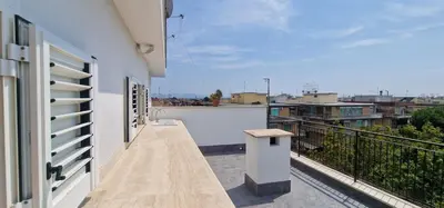 a balcony with potted plants and a gazebo at Nox Romana Apartment - Polyclinic Gemelli - Penthouse with Large Panoramic View Terrace in Rome