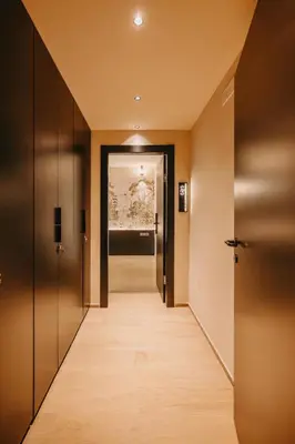 a hallway with two doors and a hallway with a hallwayngth at Guest House Praesidium in Rome