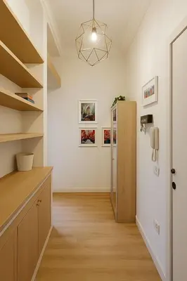 a kitchen with a refrigerator in a room at Tiepolo La Vie Apartment - Rome Flaminio in Rome