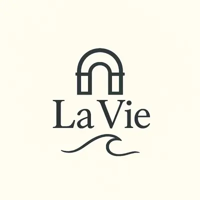 a logo for a law firm with a letter luce at Tiepolo La Vie Apartment - Rome Flaminio in Rome