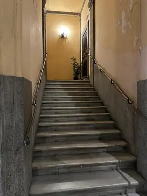 a flight of stairs in an old building at Apt Aurea Luxury Pantheon View in Rome