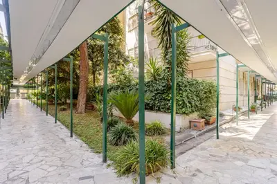 a greenhouse in a building with plants at Family House 10 Min Metro Conca d'Oro in Rome