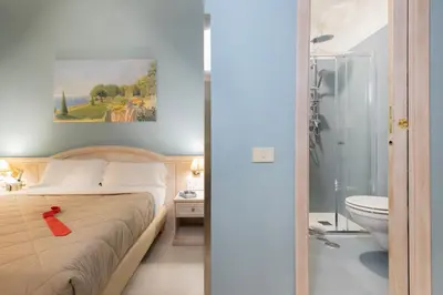 a bathroom with a sink and a shower at Piccolo Imperiale in Rome