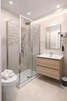 a bedroom with a bed and a television in it at Appio Rooms Haven in Rome