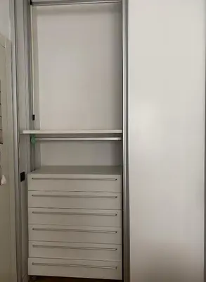 an empty white refrigerator with its door open at GeNa Home, a due passi da San Giovanni in Rome