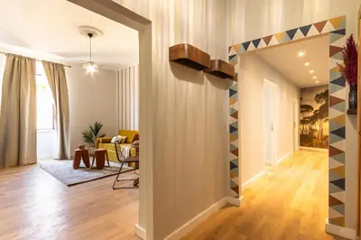 a hallway of a living room with a living room at Collection39 Scipioni Luxury Apartment in Rome