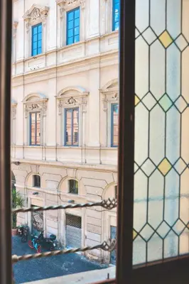 a view of a building from a window at Biscione Dream Campo de'Fiori in Rome