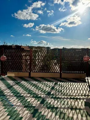 a balcony with a fence and a view of the sky at Ai Parrocchetti, Loft con Terrazza Panoramica in Rome
