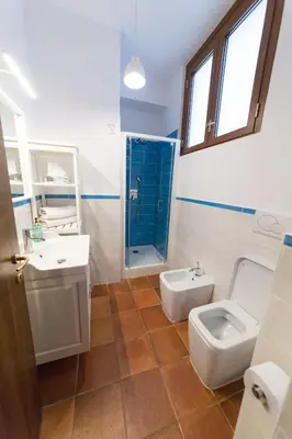 a bathroom with a sink and a toilet and a shower at wonderful apartment in Rome