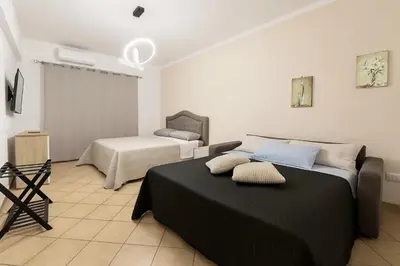 a bedroom with two beds in a room at Irpinia 19 Guest House in Rome