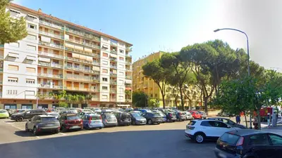 a bunch of cars parked in a parking lot at Irpinia 19 Guest House in Rome