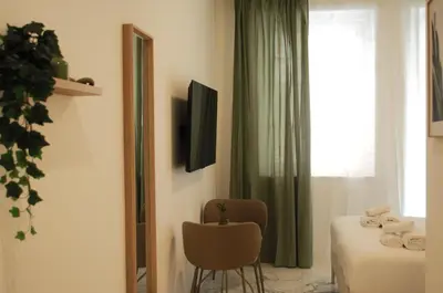 a hotel room with a bed and a window at Le Dimore del Duca in Rome