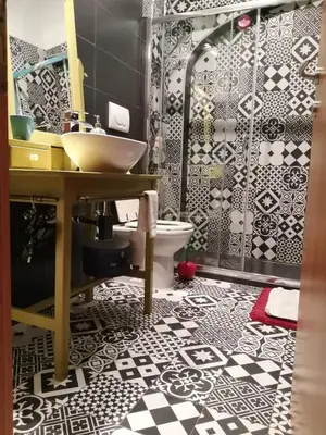 a bathroom with a sink and a toilet at FCR Rome Apartments Sweet Nest of Love in Rome