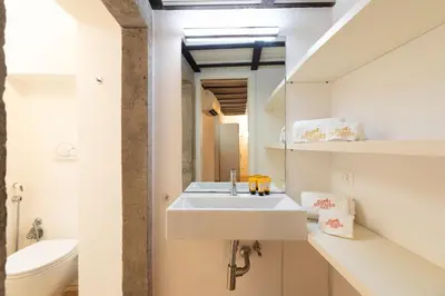 a bathroom with a sink and a toilet at Navona award Collection in Rome