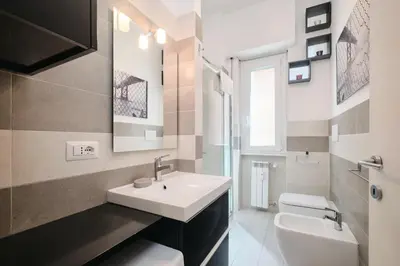 a bathroom with a sink and a toilet at Apt at Tiburtina Station Free WiFi e Netflix in Rome