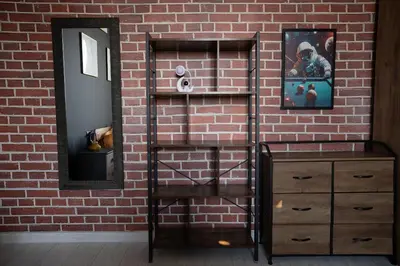 a brick wall with a shelf and a dresser and a mirror at Casa Mercanti in Rome