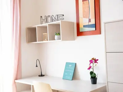 a home office with a desk and a shelf at Furio Camillo, Roma Centro in Rome