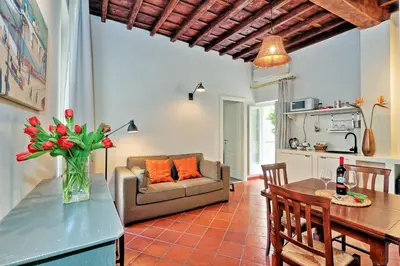 a living room with a couch and a table at Cancelleriadieci in Rome
