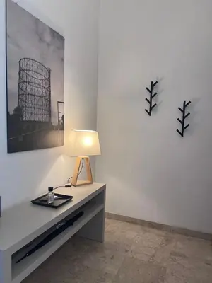 a lamp sitting on a table in a room at Appartamento Eataly in Rome