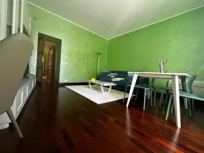 a living room with a table and a couch at Rome full apt 4 people close to Colosseum Mao house in Rome