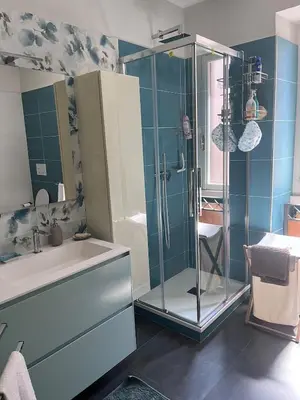 a bathroom with a glass shower and a sink at Rome full apt 4 people close to Colosseum Mao house in Rome