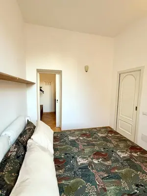 a bedroom with a large bed in a room at Domus Mantellate, Trastevere in Rome