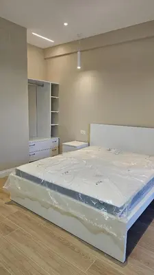 a large bed in a room with at La Belle Étoile in Rome