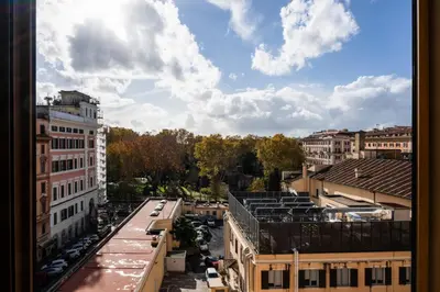 a view of a city street with buildings and cars at Piazza Vittorio Urban Stay in Rome
