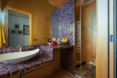 a bathroom with a tub and a sink and a shower at Piazza Vittorio Urban Stay in Rome