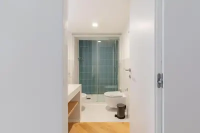 a white bathroom with a toilet and a sink at iFlat The Sweet Life in Rome in Rome