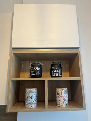a cupboard with three jars in it at Imera House City Retreat in Rome
