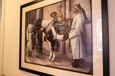 a painting of a man with a child on a horse at Elegantis Ten windows on Trastevere in Rome
