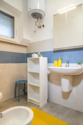 a bathroom with a sink and a toilet at Moderno e centrale, a 2 min dalla metro B in Rome