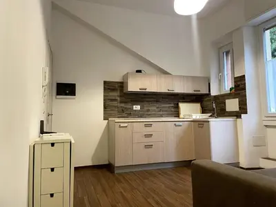 a kitchen with a counter in a room at Dream Forest in Rome