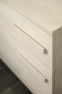 a wooden dresser with three drawers on it at Lovely apartment in the City Centre in Rome