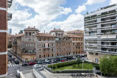 a view of a city with buildings and cars at Lungotevere Bijou with Private Balcony in Rome