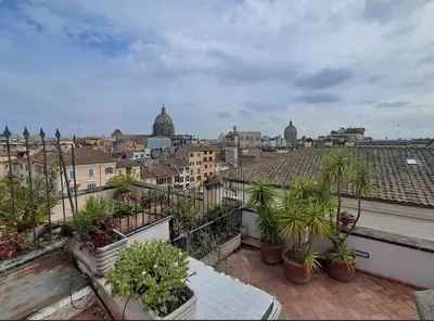 a view of a city from a balcony at Sunset Home CRIS in Rome