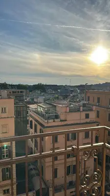 a view of a city from the balcony of a building at La Casa di Bru - Cinque Camere - Dieci posti - Terrazzo in Rome