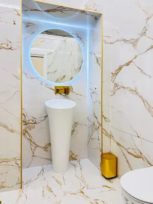 a bathroom with a white toilet and a mirror at Trevi Fountain Elegant Suites by Marianna in Rome