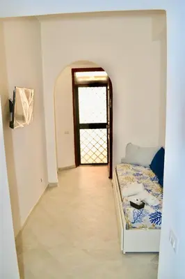 a group of towels and a basket on a bed at Rome Central Colosseum Flat in Rome